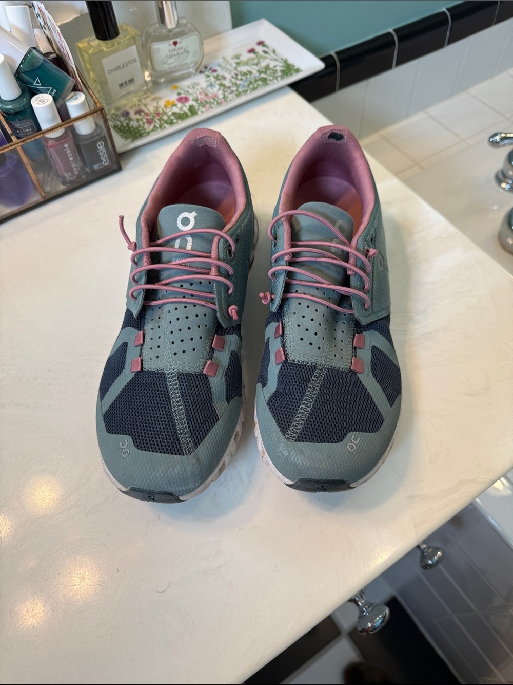 On Running women’s Cloud sneakers in Teal and Pink